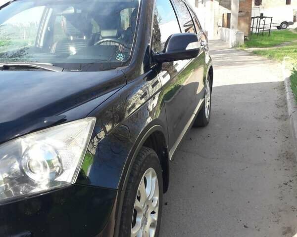 Чорний Хонда СРВ, об'ємом двигуна 2.4 л та пробігом 265 тис. км за 12200 $, фото 3 на Automoto.ua