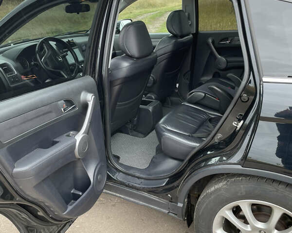 Черный Хонда СРВ, объемом двигателя 2 л и пробегом 279 тыс. км за 11400 $, фото 6 на Automoto.ua