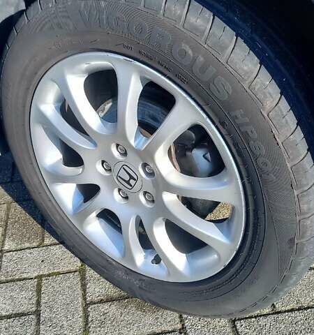 Черный Хонда СРВ, объемом двигателя 2 л и пробегом 157 тыс. км за 13500 $, фото 4 на Automoto.ua