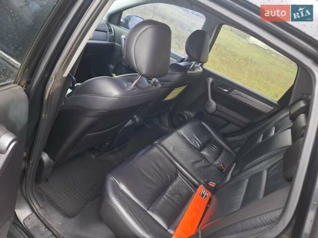 Чорний Хонда СРВ, об'ємом двигуна 2.4 л та пробігом 253 тис. км за 11800 $, фото 6 на Automoto.ua