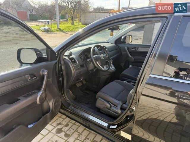 Черный Хонда СРВ, объемом двигателя 2.35 л и пробегом 258 тыс. км за 13500 $, фото 5 на Automoto.ua