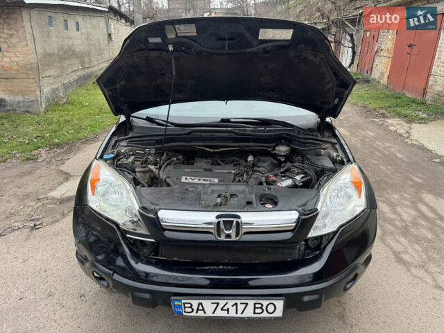 Черный Хонда СРВ, объемом двигателя 2.35 л и пробегом 240 тыс. км за 6900 $, фото 50 на Automoto.ua