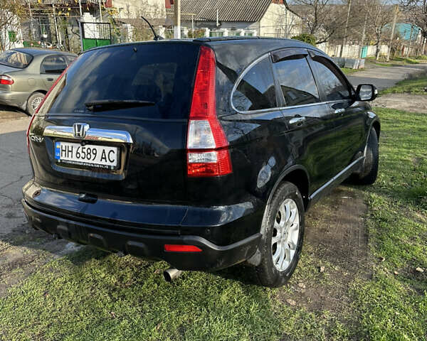 Черный Хонда СРВ, объемом двигателя 2.4 л и пробегом 133 тыс. км за 9499 $, фото 6 на Automoto.ua