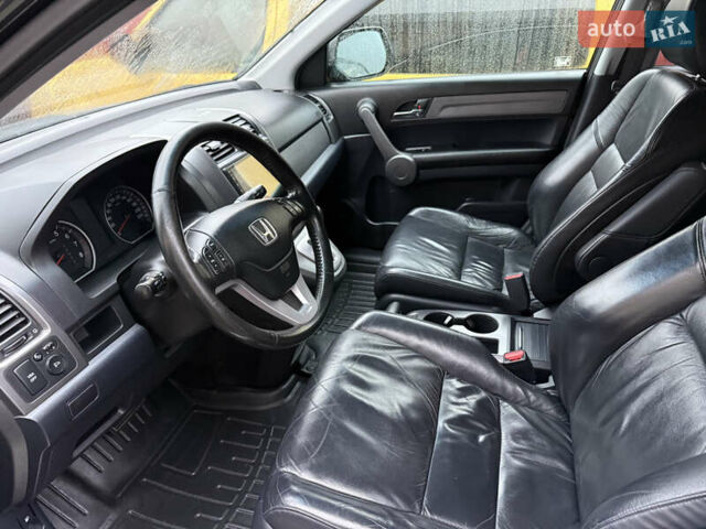 Черный Хонда СРВ, объемом двигателя 2.35 л и пробегом 141 тыс. км за 13000 $, фото 3 на Automoto.ua