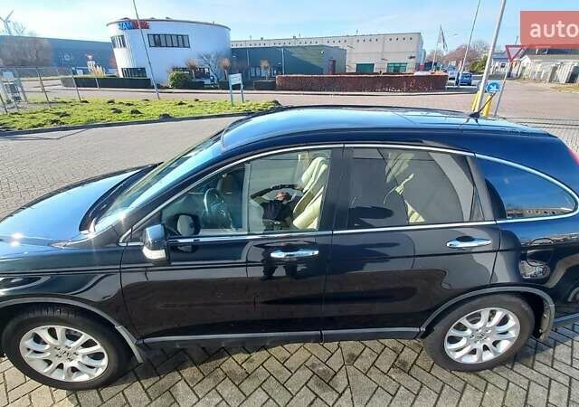 Черный Хонда СРВ, объемом двигателя 2 л и пробегом 157 тыс. км за 13500 $, фото 1 на Automoto.ua