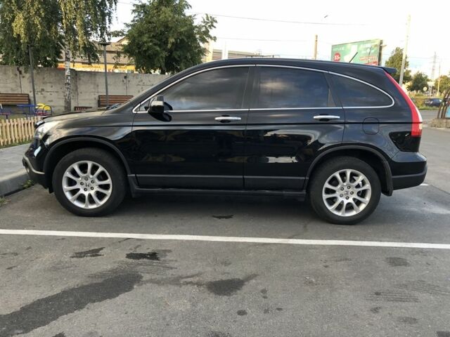 Чорний Хонда СРВ, об'ємом двигуна 2.4 л та пробігом 226 тис. км за 11700 $, фото 1 на Automoto.ua