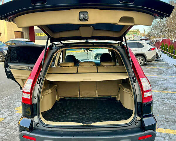 Черный Хонда СРВ, объемом двигателя 2.4 л и пробегом 203 тыс. км за 10400 $, фото 7 на Automoto.ua