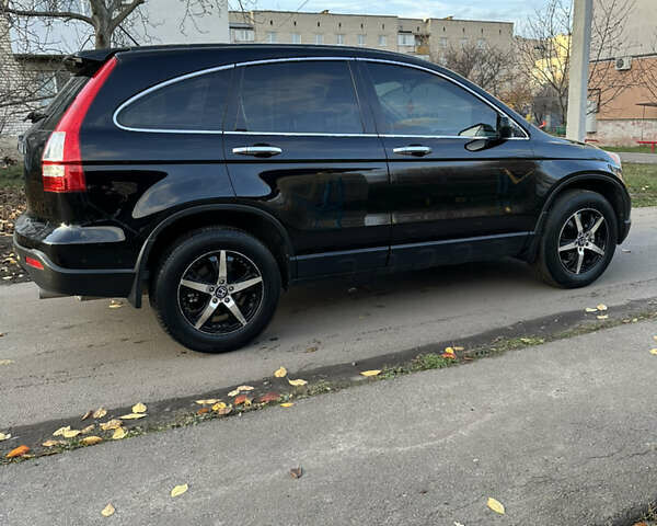 Черный Хонда СРВ, объемом двигателя 2.4 л и пробегом 180 тыс. км за 10500 $, фото 3 на Automoto.ua