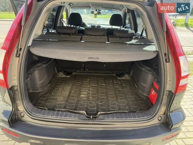 Черный Хонда СРВ, объемом двигателя 2.35 л и пробегом 258 тыс. км за 13500 $, фото 7 на Automoto.ua