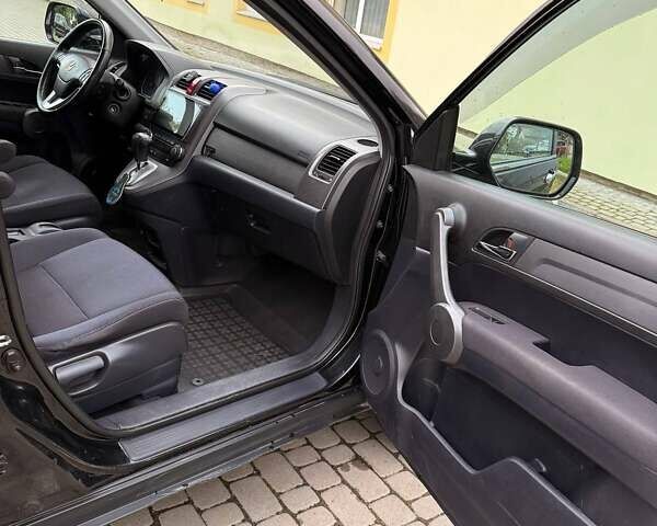 Черный Хонда СРВ, объемом двигателя 2 л и пробегом 202 тыс. км за 12500 $, фото 12 на Automoto.ua