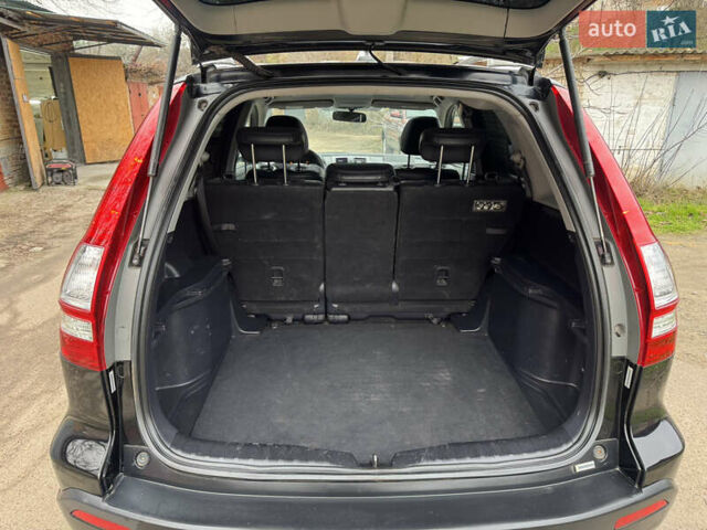 Черный Хонда СРВ, объемом двигателя 2.35 л и пробегом 240 тыс. км за 6900 $, фото 38 на Automoto.ua