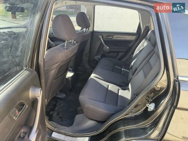 Черный Хонда СРВ, объемом двигателя 2.35 л и пробегом 258 тыс. км за 13500 $, фото 6 на Automoto.ua