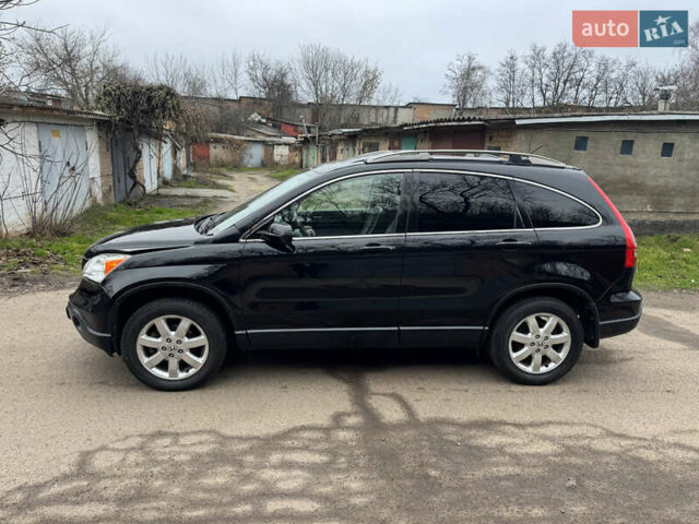 Черный Хонда СРВ, объемом двигателя 2.35 л и пробегом 240 тыс. км за 6900 $, фото 2 на Automoto.ua