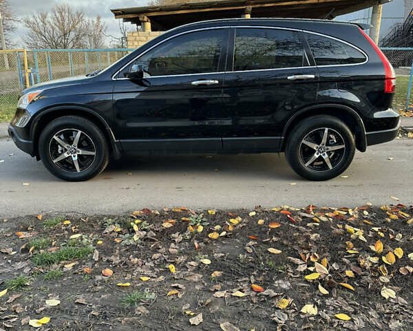 Черный Хонда СРВ, объемом двигателя 2.4 л и пробегом 180 тыс. км за 10500 $, фото 1 на Automoto.ua