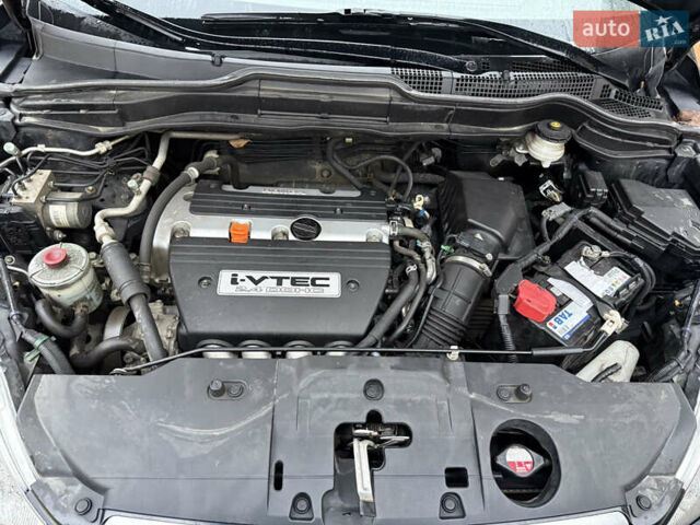 Черный Хонда СРВ, объемом двигателя 2.35 л и пробегом 141 тыс. км за 13000 $, фото 6 на Automoto.ua