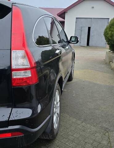 Чорний Хонда СРВ, об'ємом двигуна 2 л та пробігом 234 тис. км за 11299 $, фото 1 на Automoto.ua