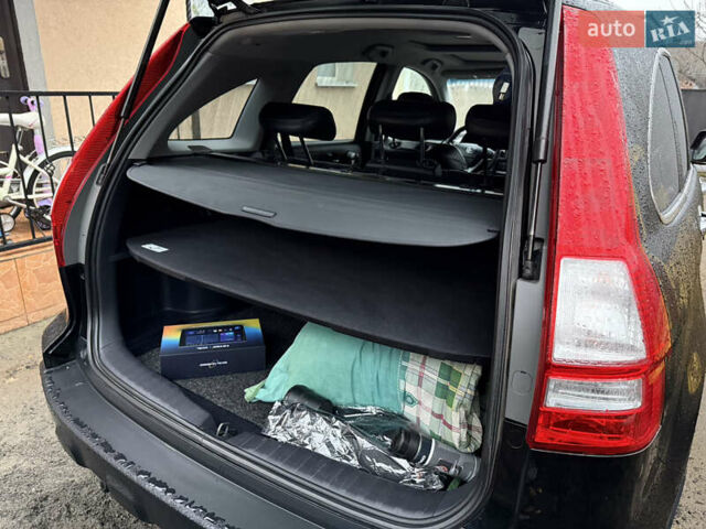 Черный Хонда СРВ, объемом двигателя 2.35 л и пробегом 141 тыс. км за 13000 $, фото 7 на Automoto.ua