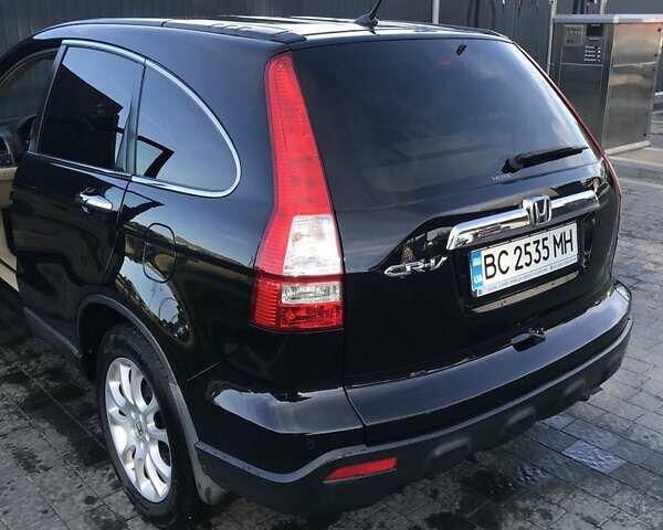 Чорний Хонда СРВ, об'ємом двигуна 2.2 л та пробігом 245 тис. км за 10800 $, фото 1 на Automoto.ua