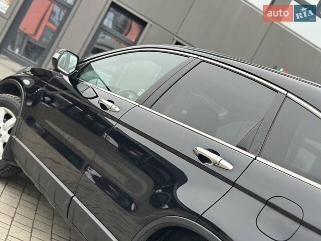 Чорний Хонда СРВ, об'ємом двигуна 2 л та пробігом 185 тис. км за 10150 $, фото 35 на Automoto.ua