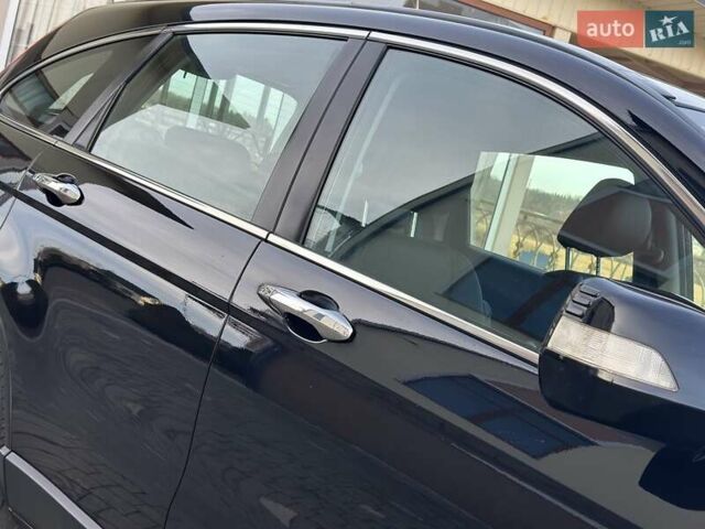 Чорний Хонда СРВ, об'ємом двигуна 2 л та пробігом 191 тис. км за 10450 $, фото 27 на Automoto.ua