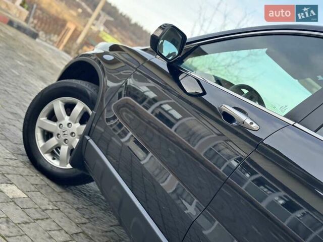 Чорний Хонда СРВ, об'ємом двигуна 2 л та пробігом 191 тис. км за 10450 $, фото 42 на Automoto.ua