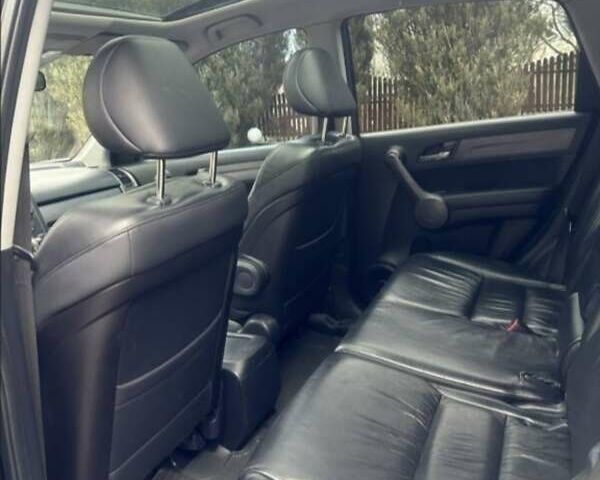 Черный Хонда СРВ, объемом двигателя 2.35 л и пробегом 180 тыс. км за 13700 $, фото 2 на Automoto.ua