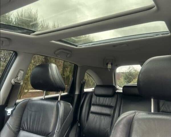 Черный Хонда СРВ, объемом двигателя 2.35 л и пробегом 180 тыс. км за 13700 $, фото 1 на Automoto.ua