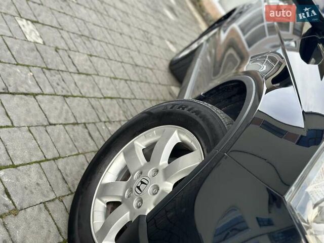 Чорний Хонда СРВ, об'ємом двигуна 2 л та пробігом 191 тис. км за 10450 $, фото 23 на Automoto.ua