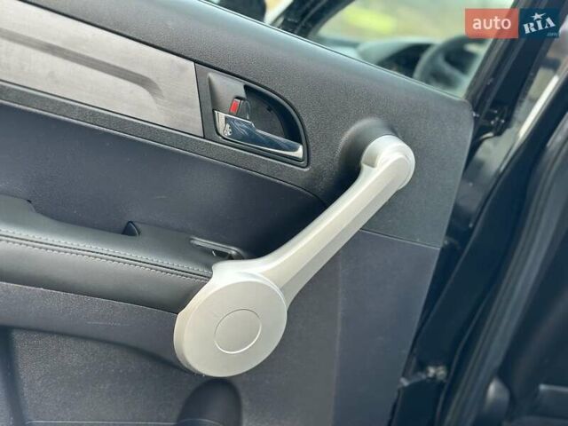 Чорний Хонда СРВ, об'ємом двигуна 2 л та пробігом 191 тис. км за 10450 $, фото 76 на Automoto.ua