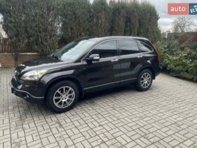 Черный Хонда СРВ, объемом двигателя 2.35 л и пробегом 180 тыс. км за 13700 $, фото 6 на Automoto.ua