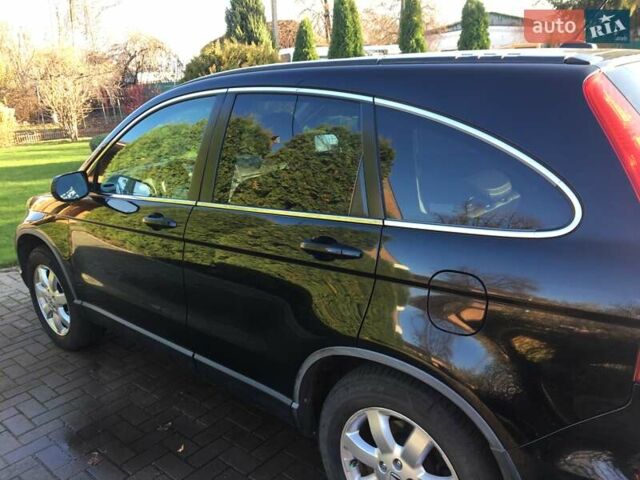 Черный Хонда СРВ, объемом двигателя 2.4 л и пробегом 209 тыс. км за 11200 $, фото 2 на Automoto.ua