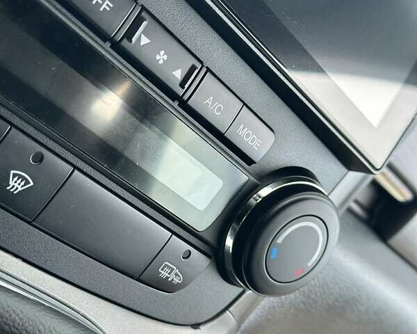 Чорний Хонда СРВ, об'ємом двигуна 2 л та пробігом 191 тис. км за 10450 $, фото 78 на Automoto.ua