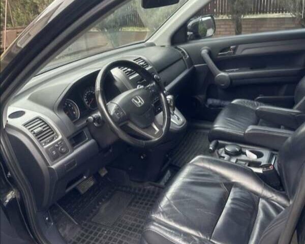 Черный Хонда СРВ, объемом двигателя 2.35 л и пробегом 180 тыс. км за 13700 $, фото 4 на Automoto.ua