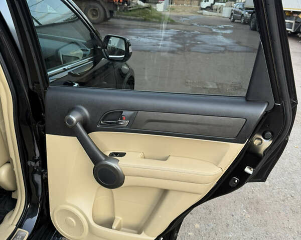 Черный Хонда СРВ, объемом двигателя 2.4 л и пробегом 200 тыс. км за 12500 $, фото 10 на Automoto.ua