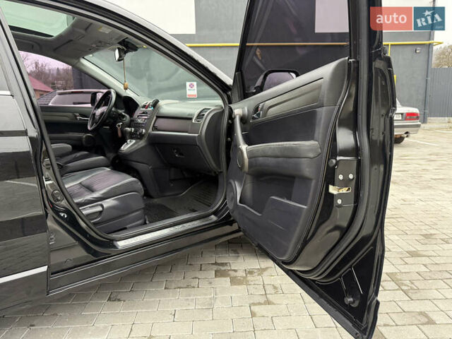 Черный Хонда СРВ, объемом двигателя 2.2 л и пробегом 227 тыс. км за 13000 $, фото 22 на Automoto.ua