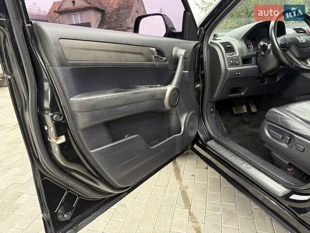 Черный Хонда СРВ, объемом двигателя 2.2 л и пробегом 227 тыс. км за 13000 $, фото 12 на Automoto.ua