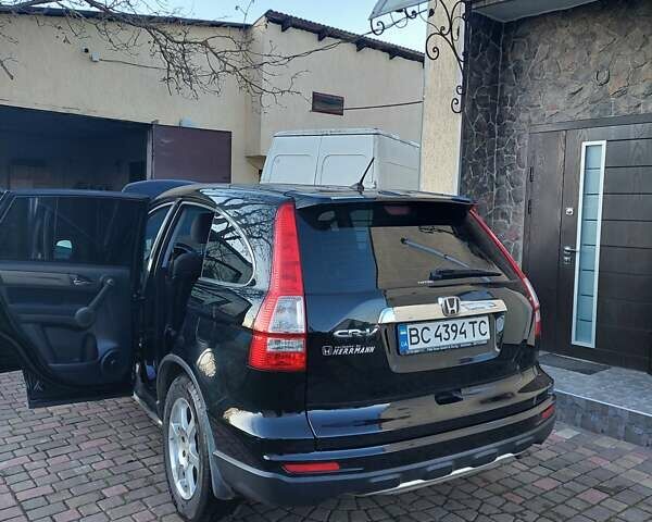 Черный Хонда СРВ, объемом двигателя 2.2 л и пробегом 140 тыс. км за 12900 $, фото 2 на Automoto.ua