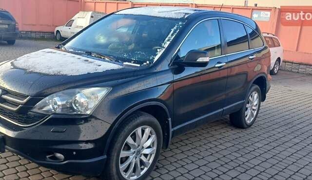 Черный Хонда СРВ, объемом двигателя 2.4 л и пробегом 295 тыс. км за 10500 $, фото 1 на Automoto.ua