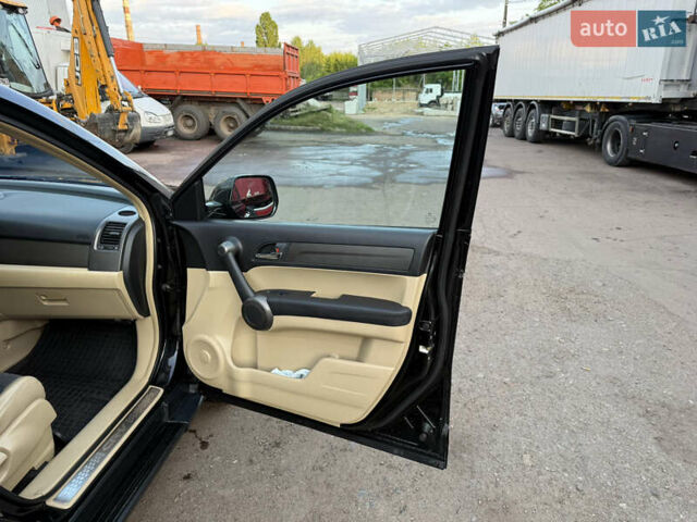 Черный Хонда СРВ, объемом двигателя 2.4 л и пробегом 200 тыс. км за 12500 $, фото 1 на Automoto.ua