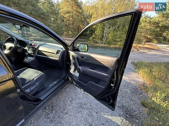 Чорний Хонда СРВ, об'ємом двигуна 2 л та пробігом 159 тис. км за 11650 $, фото 14 на Automoto.ua