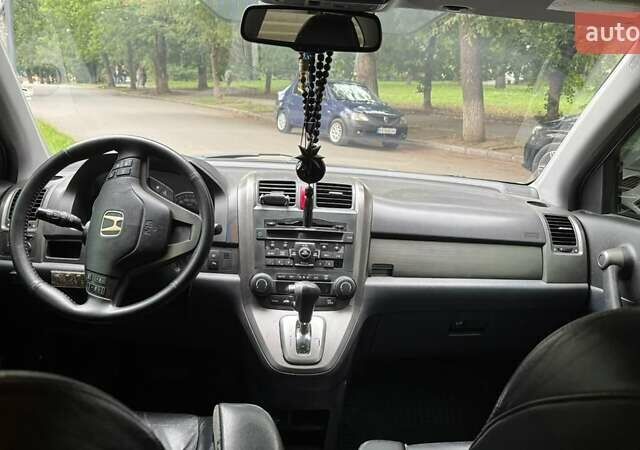 Черный Хонда СРВ, объемом двигателя 2.4 л и пробегом 197 тыс. км за 12900 $, фото 4 на Automoto.ua