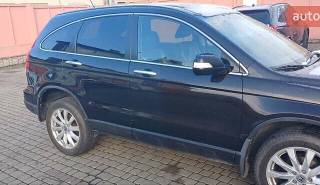 Черный Хонда СРВ, объемом двигателя 2.4 л и пробегом 295 тыс. км за 10500 $, фото 4 на Automoto.ua