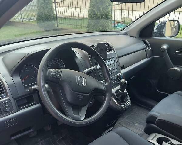 Черный Хонда СРВ, объемом двигателя 2.2 л и пробегом 140 тыс. км за 12900 $, фото 5 на Automoto.ua