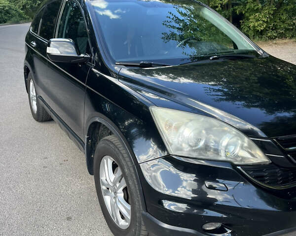 Чорний Хонда СРВ, об'ємом двигуна 2 л та пробігом 280 тис. км за 10500 $, фото 4 на Automoto.ua
