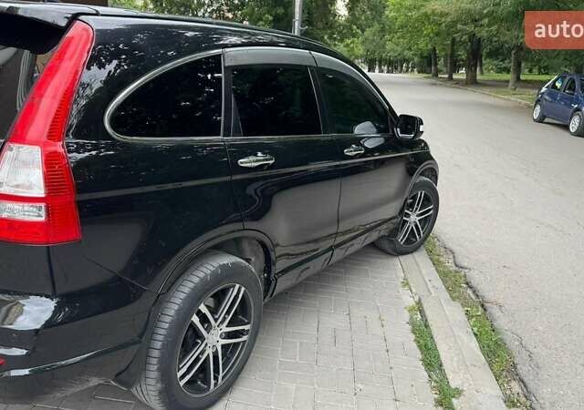 Черный Хонда СРВ, объемом двигателя 2.4 л и пробегом 197 тыс. км за 12900 $, фото 6 на Automoto.ua