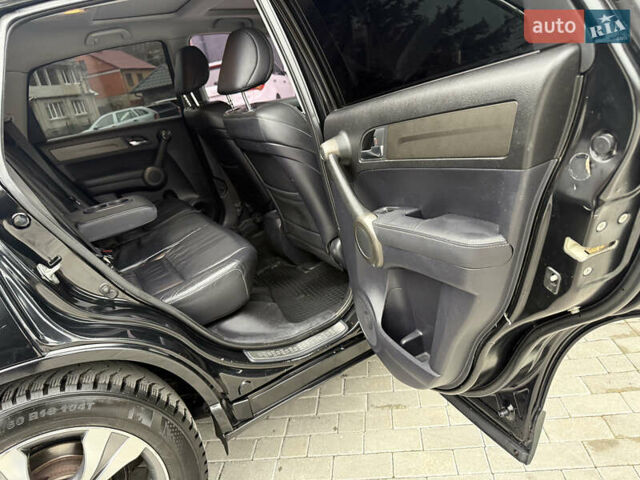 Черный Хонда СРВ, объемом двигателя 2.2 л и пробегом 279 тыс. км за 13000 $, фото 18 на Automoto.ua