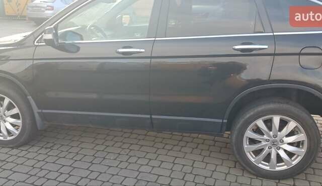 Черный Хонда СРВ, объемом двигателя 2.4 л и пробегом 295 тыс. км за 10500 $, фото 5 на Automoto.ua