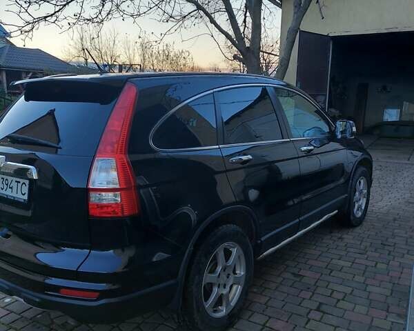 Черный Хонда СРВ, объемом двигателя 2.2 л и пробегом 140 тыс. км за 12900 $, фото 1 на Automoto.ua