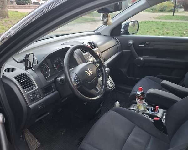 Чорний Хонда СРВ, об'ємом двигуна 2 л та пробігом 308 тис. км за 9500 $, фото 2 на Automoto.ua