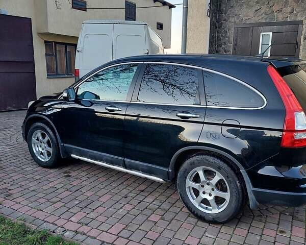 Черный Хонда СРВ, объемом двигателя 2.2 л и пробегом 140 тыс. км за 12900 $, фото 3 на Automoto.ua